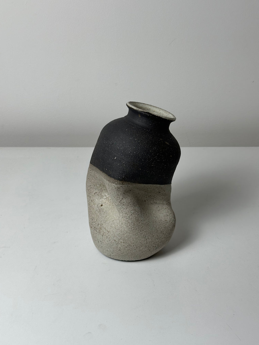 Warped Vase — Matte white #2 (Black clay)